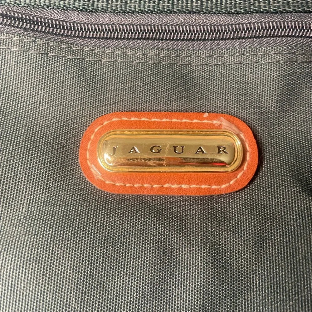 Jaguar: vintage 90s deep green wardrobe bag